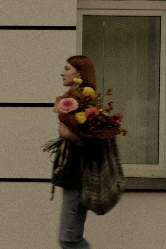The bouquet left blurred by the street